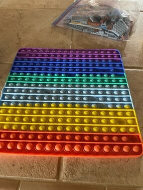 Kids Rainbow Pop Sensory Fidget Mat - Multicolor